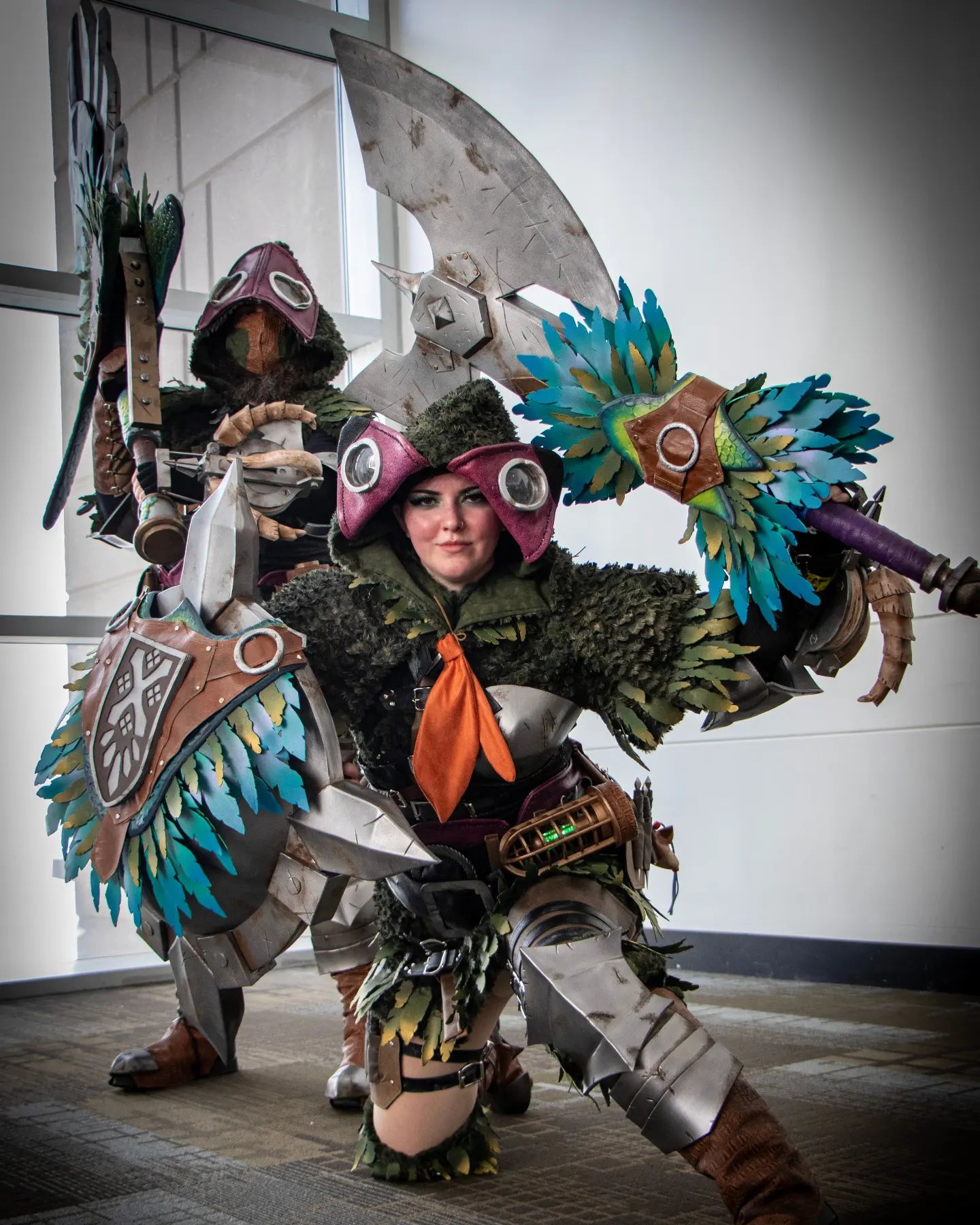 Hi can you tell I was overheated 
UwU I absolutely love how our Pukei cosplays turned out! All the feathers, the colors, the different textures, it's all so fun! Wearing them wasn't too fun, they're hot and the sword is heavy, which is why @mechastine took over the sword 😵‍💫

Thank you so much for the photos @happynerdphoto 
All foam from @thefoamory 

#cosplay #cosplayer #monsterhunterarmor #monsterhuntercosplay #monsterhunterworld #pukeicosplay #pukeipukei #pukei #capcom #capcommonsterhunter #foamsmith #evafoam #planetcomicon #pckc #planetcomicon2024